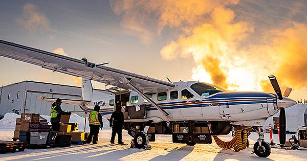 Wright Air Service employees in Fairbanks load a Cessna Grand Caravan bound for the Yukon River village of Nulato on the morning of Jan. 23, 2024, when the temperature was about minus 35 Fahrenheit.